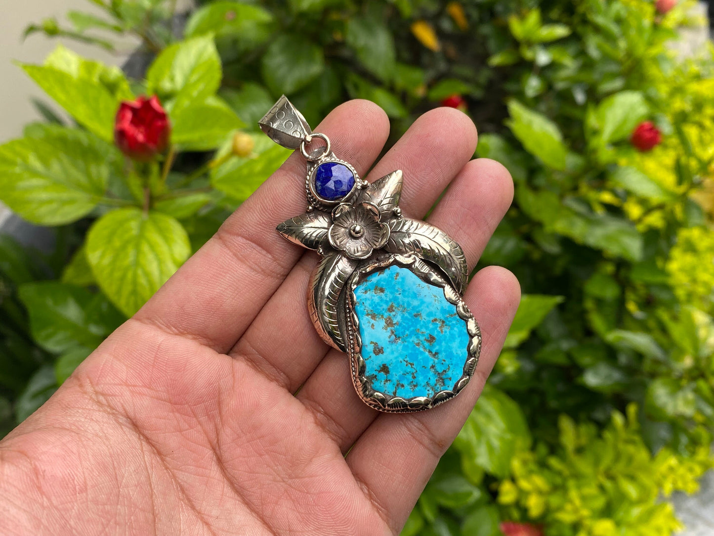 Aesthetic Natural Turquoise Pendant for daily wear, Floral details on Tibetan silver and adornment of Raw Lapis, Unique piece, Boho fashion.