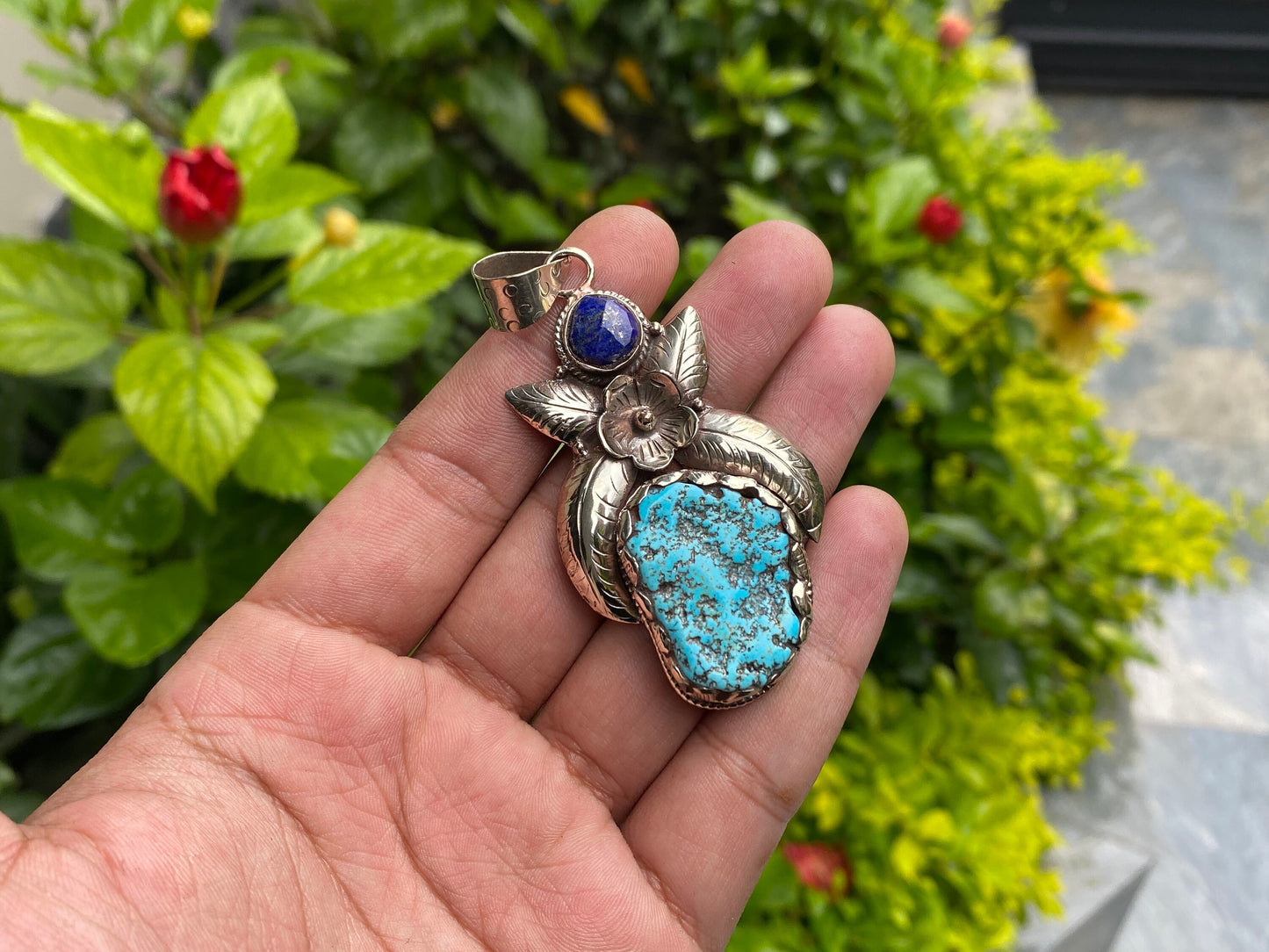 Aesthetic Natural Turquoise Pendant for daily wear, Floral details on Tibetan silver and adornment of Raw Lapis, Unique piece, Boho fashion.