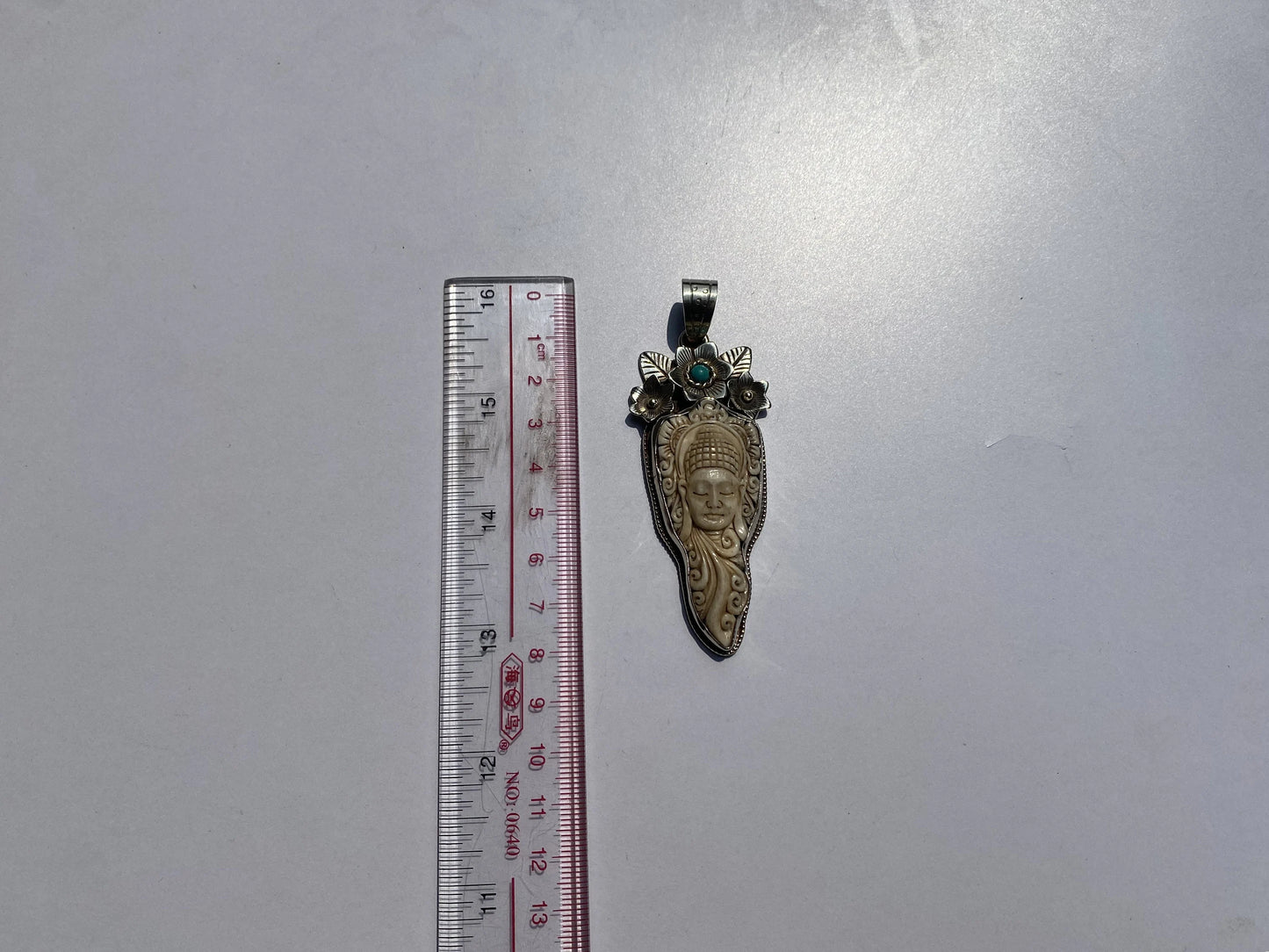 Artisan Tibetan Silver Pendant with Buddha on Bone Detail, Elegant Tibetan Silver Pendant with Bone Carving of Buddha with Turquoise.