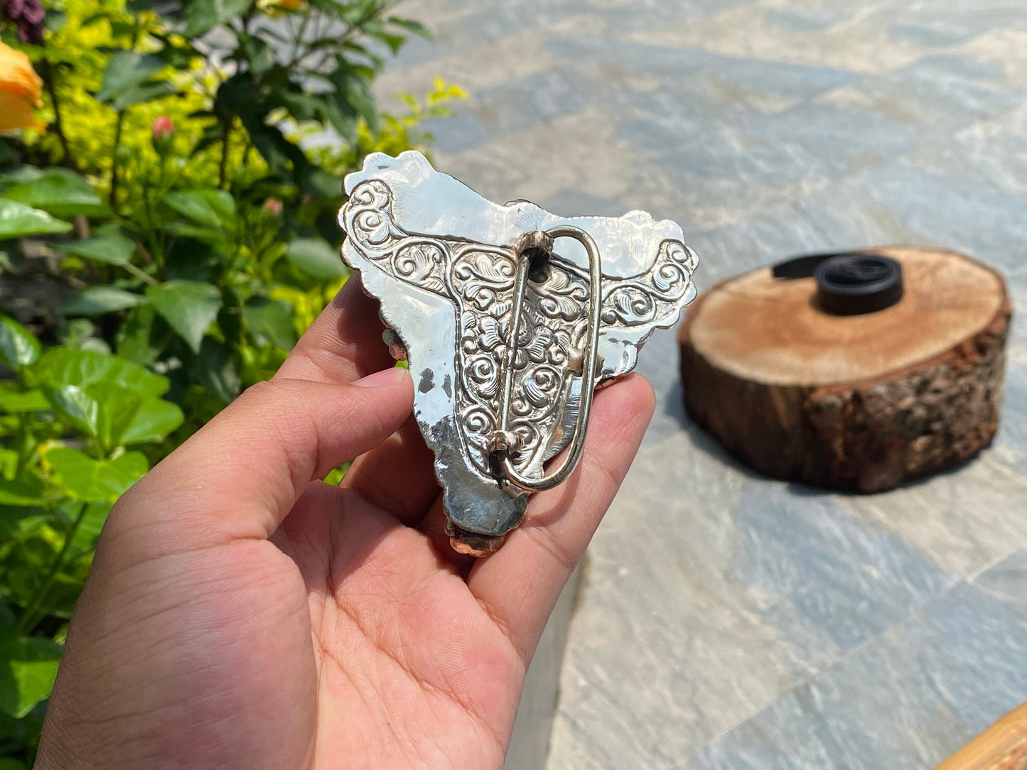 Bulls head shaped Tibetan Silver Belt Buckle adorned with Natural Turquoise, Red Coral, Black Onyx. Floral Design carved on buffalo bone.