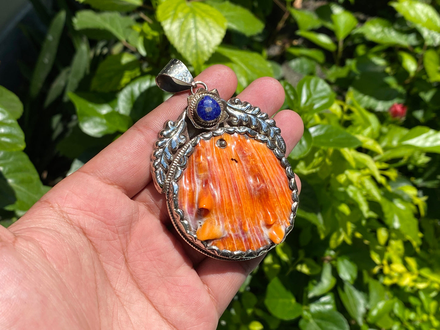 Desert Sea Gem: Oceanic Tibetan Silver Pendant from Nepal, Big Spiny orange oyster pendant adorned with natural raw lapis, Unique gift idea.