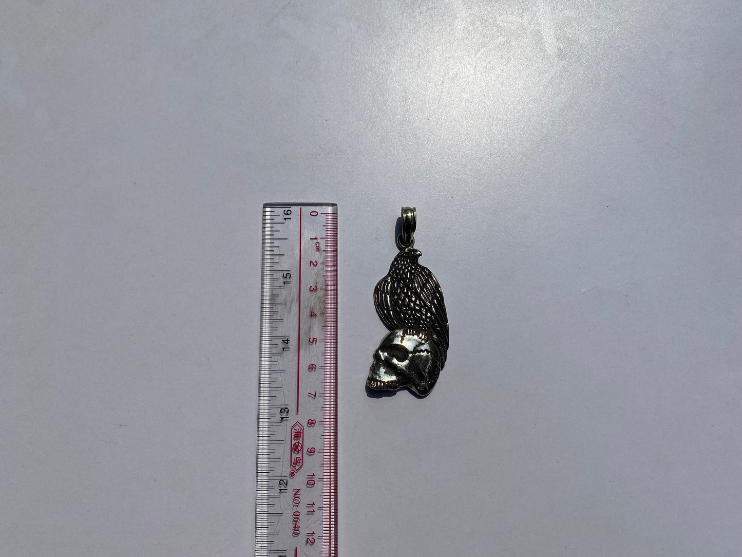 Handcrafted Skull and Eagle Tibetan Silver Pendant, Eagle-Topped Skull Head Tibetan Silver Pendant.