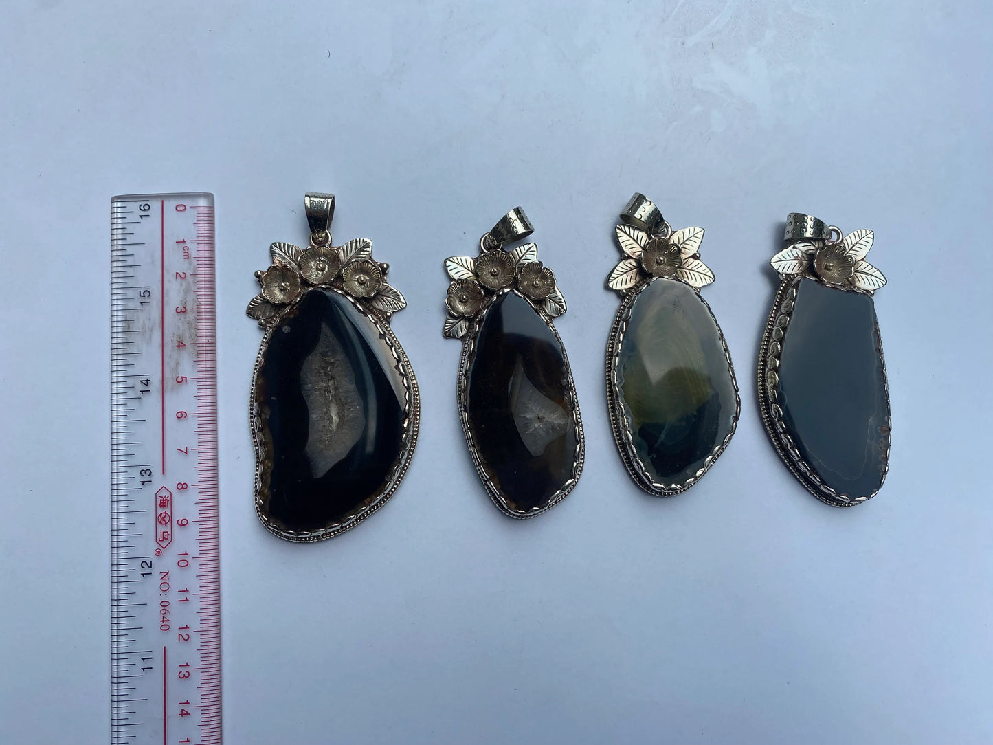 Handcrafted by Mother Nature: Agate Slice Pendant decorated with Tibetan Silver Details.