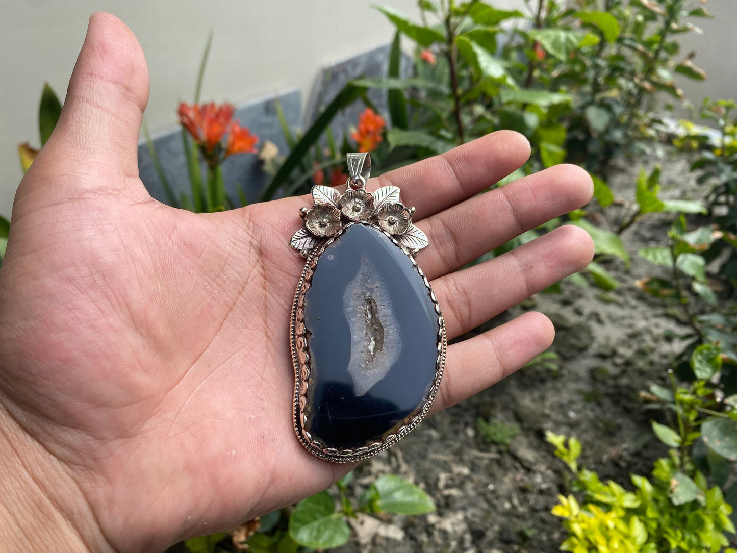 Handcrafted by Mother Nature: Agate Slice Pendant decorated with Tibetan Silver Details.