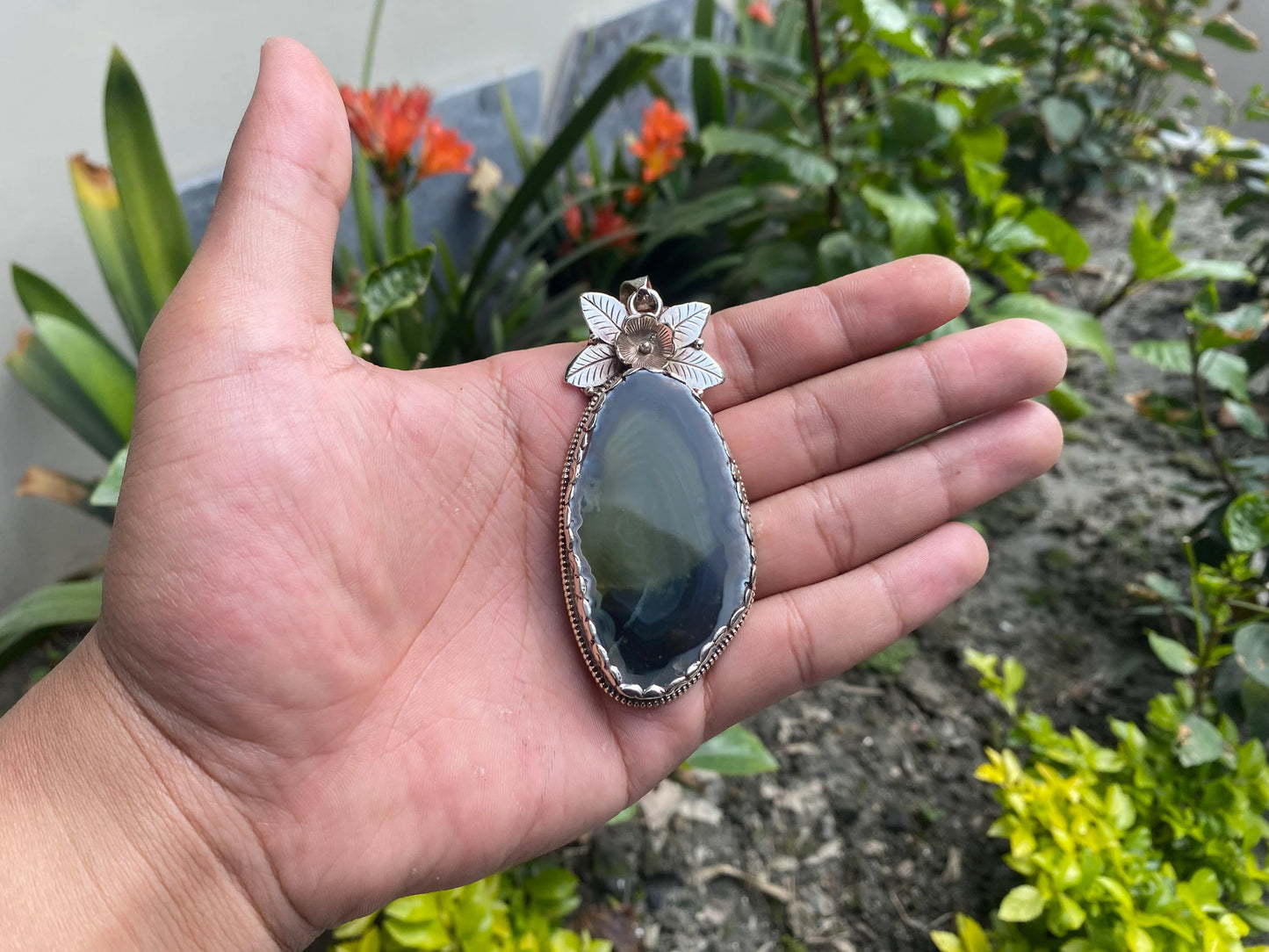 Handcrafted by Mother Nature: Agate Slice Pendant decorated with Tibetan Silver Details.