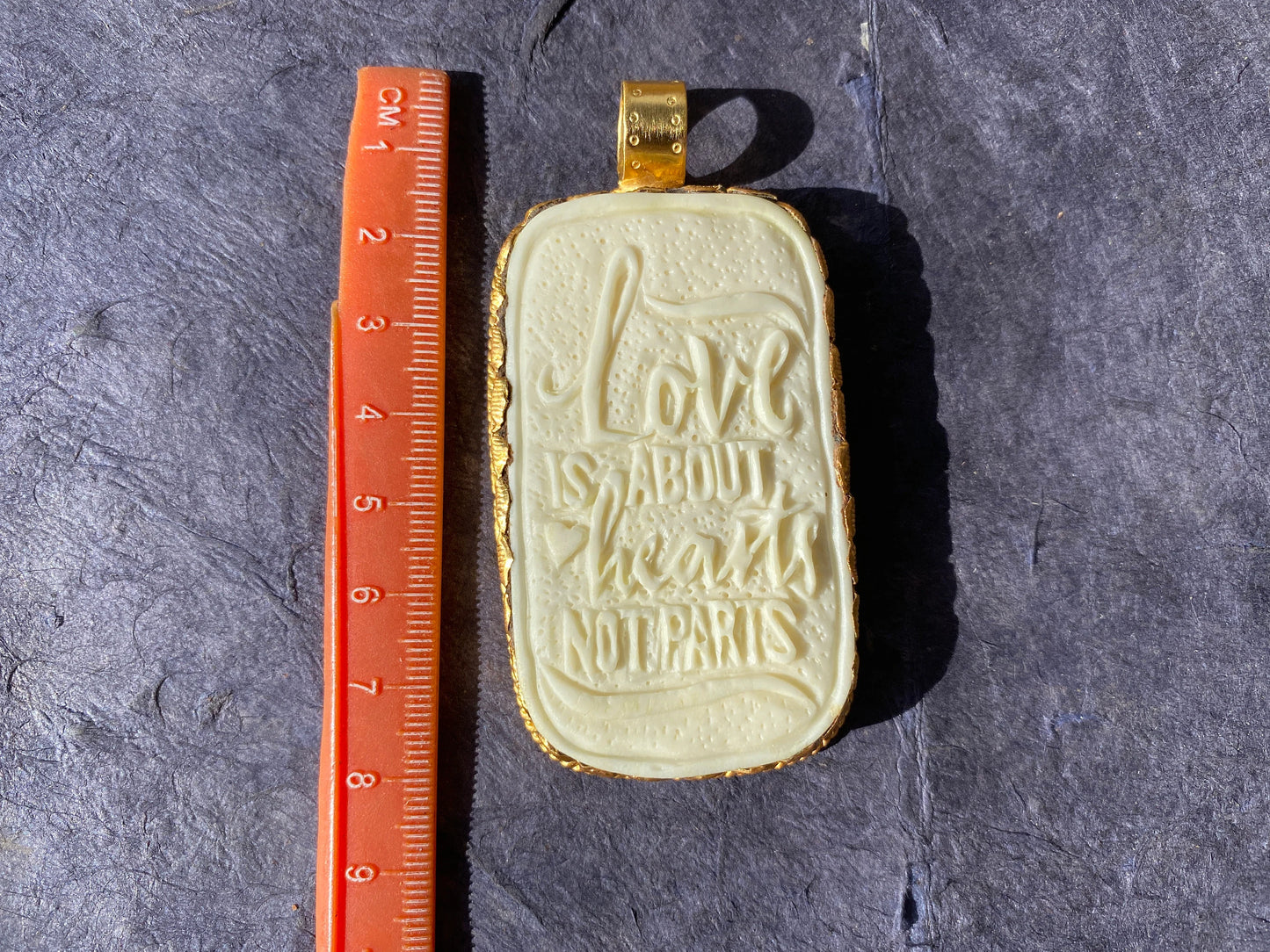 LGBTQ Pendant, Love Is About Hearts Not Parts, Carved Bone 18K Brushed Gold Overlay Pendant, Gay & Lesbian Pride, Great Gift for Proud Gay