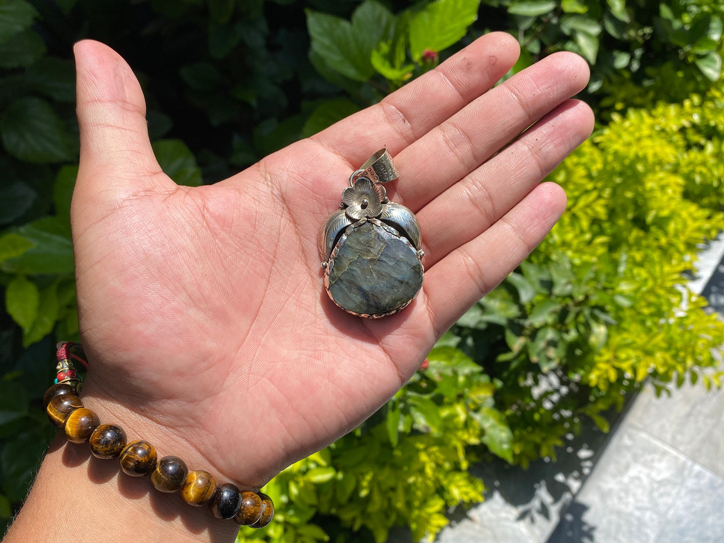 Natural Labradorite Pendant adorned with Tibetan Silver details, Floral Themed Pendant, Unisex pendant for fashion lovers, Bohemian pendant.