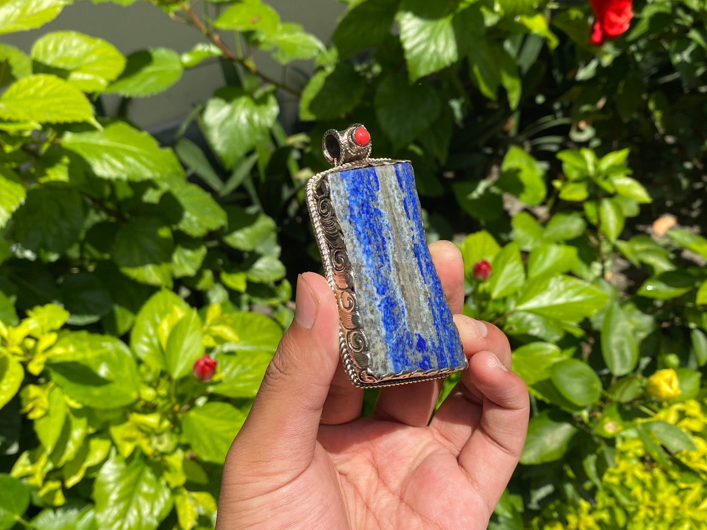 Natural Raw Lapis Pendant adorned with Tibetan Silver & Red Coral, Hammered Floral Design, Aesthetic Pendant for daily wear, Unique Pendant.
