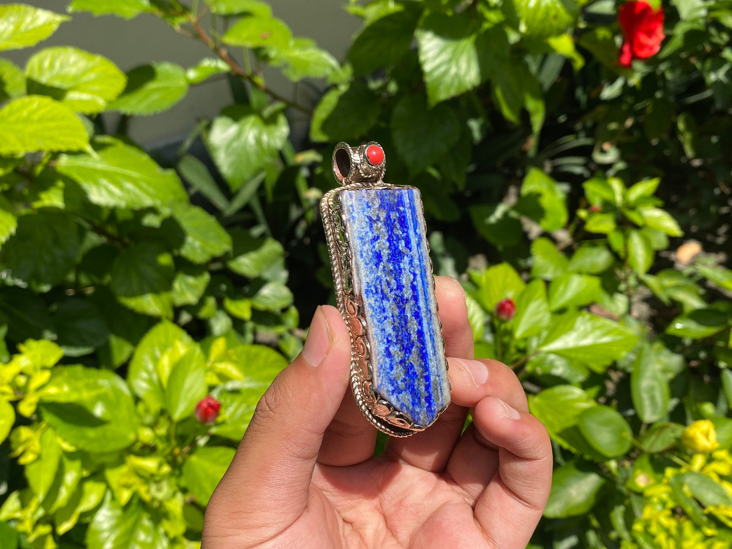 Natural Raw Lapis Pendant adorned with Tibetan Silver & Red Coral, Hammered Floral Design, Aesthetic Pendant for daily wear, Unique Pendant.