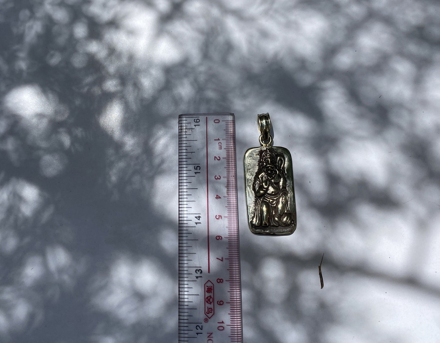 Sacred Hanuman Carving in Tibetan Silver: A Divine Tribute, A Divine Sculpture Reflecting Ancient Wisdom.