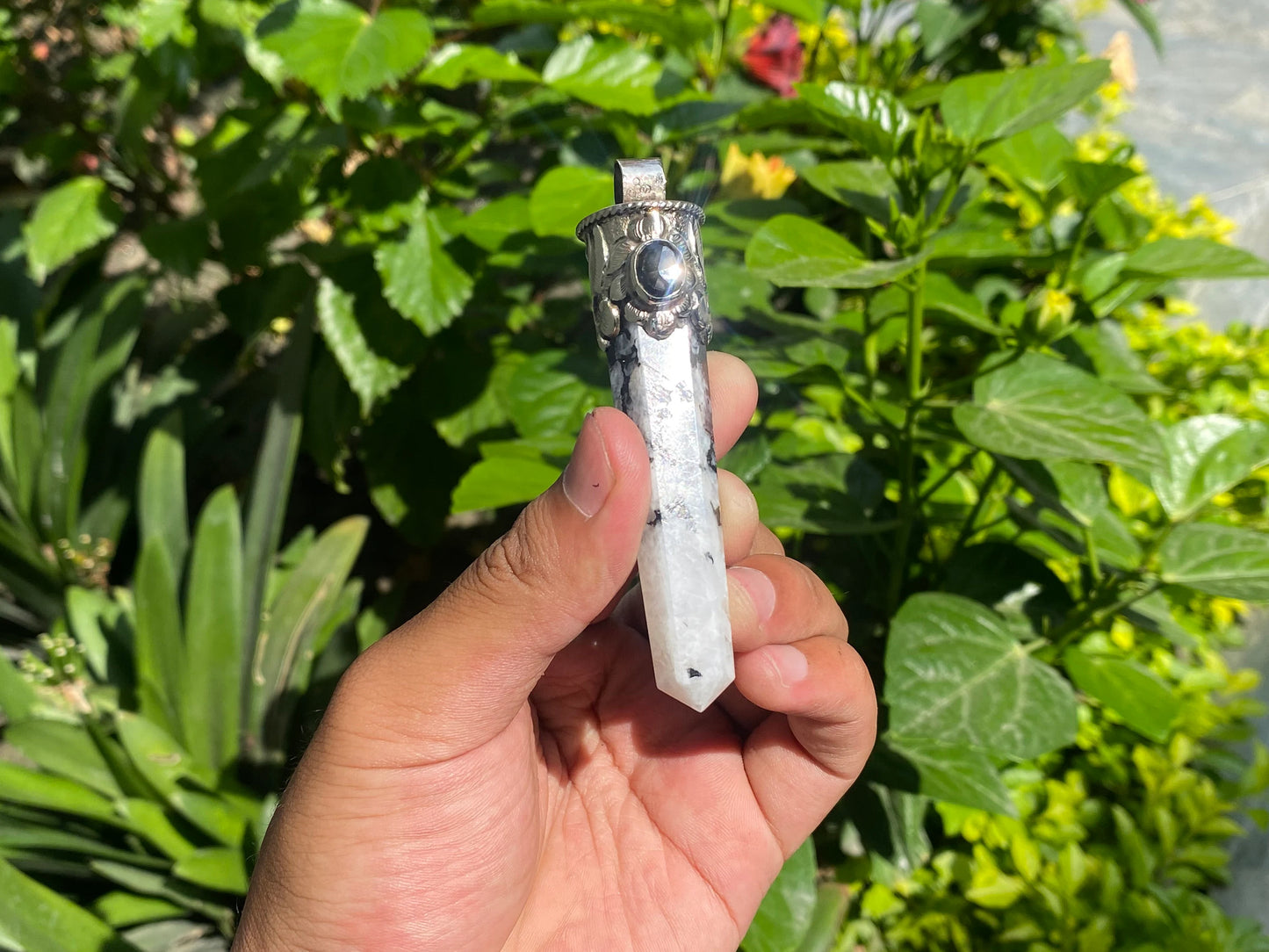 Unisex Healing Pendant: Stylish and Unique from Nepal, Moonstone pendant adorned with Black onyx.