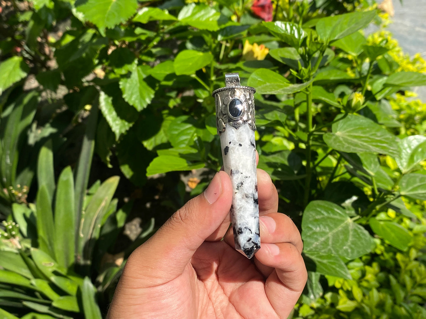 Unisex Healing Pendant: Stylish and Unique from Nepal, Moonstone pendant adorned with Black onyx.