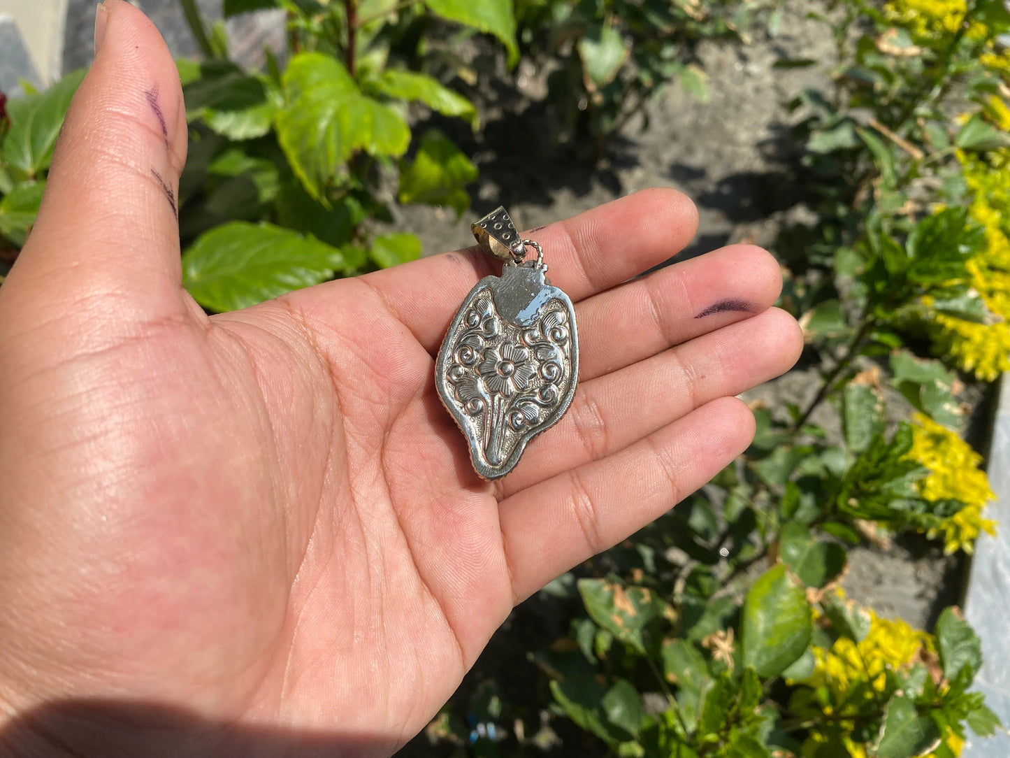 Spirit of the Wilderness: Tibetan Silver Wolf Head Pendant, Wolf Head Amulet in Tibetan Silver.