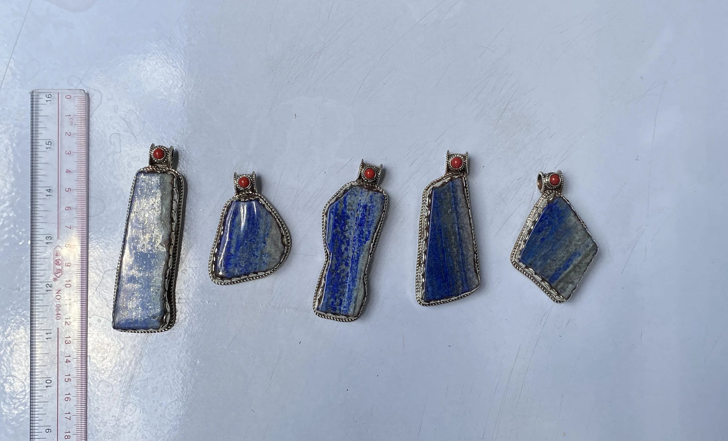 Unique Raw Lapis Pendant adorned with Red Coral and Tibetan Silver, Daily wear Pendant, Handmade Floral Design, Unisex Pendant, Unique gift.