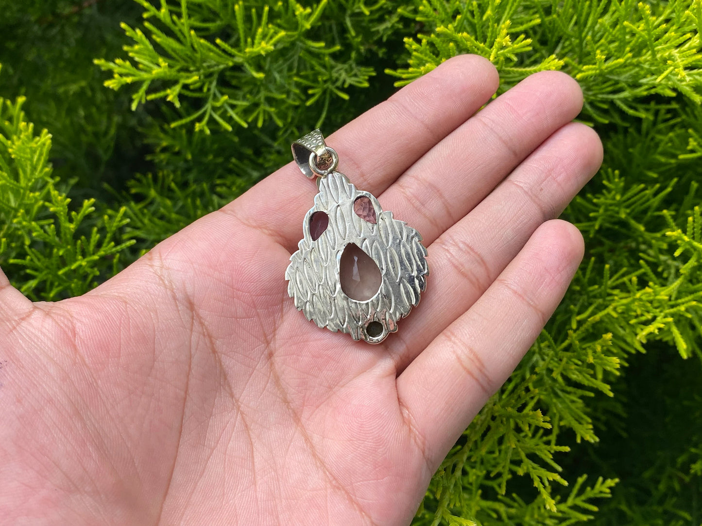 Unique Tibetan silver pendant adorned with Smokey Quartz, Peridot and Amethyst, Handmade floral design, Collectible pendant for daily wear.