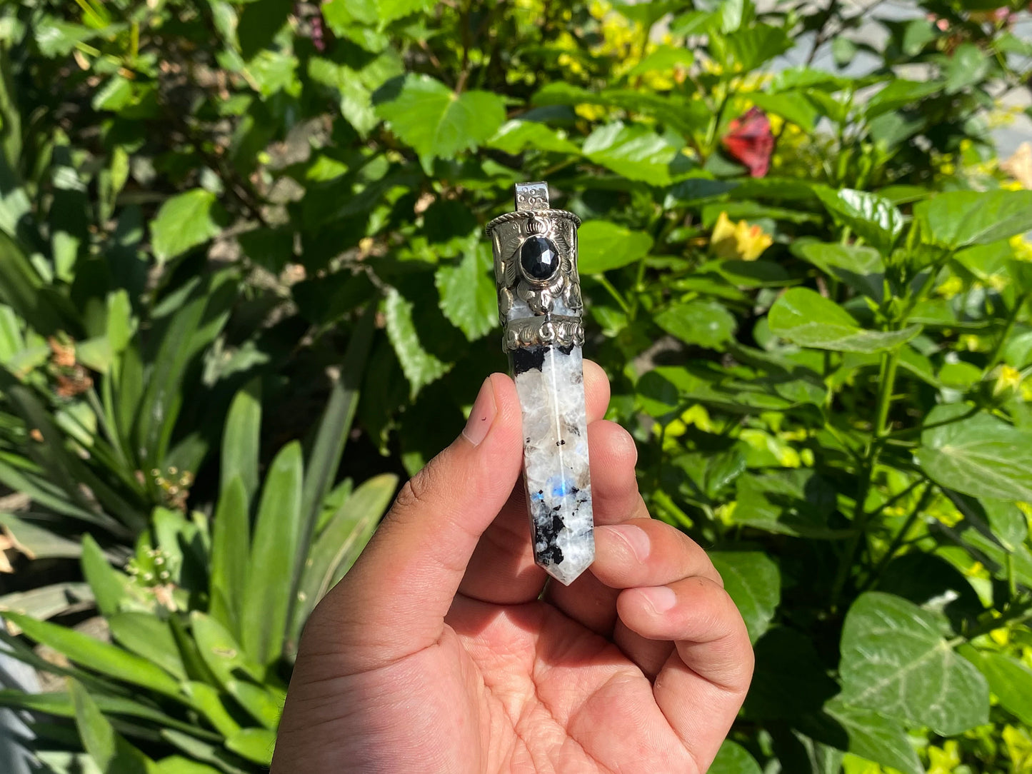 Unisex Healing Pendant: Stylish and Unique from Nepal, Moonstone pendant adorned with Black onyx.