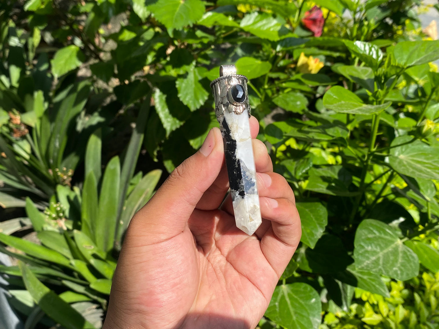 Unisex Healing Pendant: Stylish and Unique from Nepal, Moonstone pendant adorned with Black onyx.