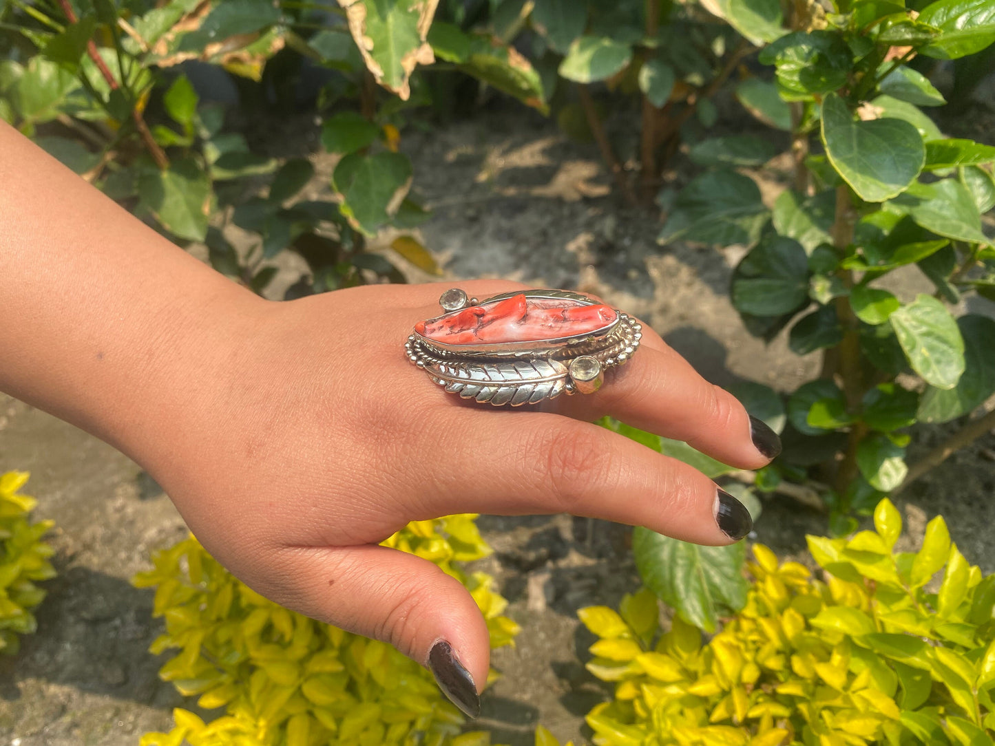 Hammered Spiny Oyster Ring with Floral Carved Design on Tibetan silver.
