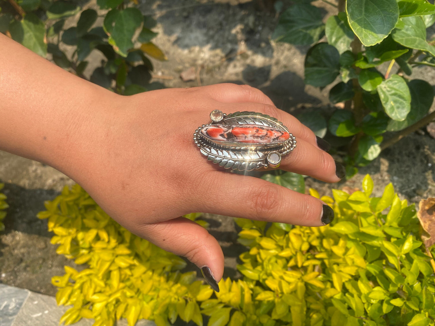 Hammered Spiny Oyster Ring with Floral Carved Design on Tibetan silver.