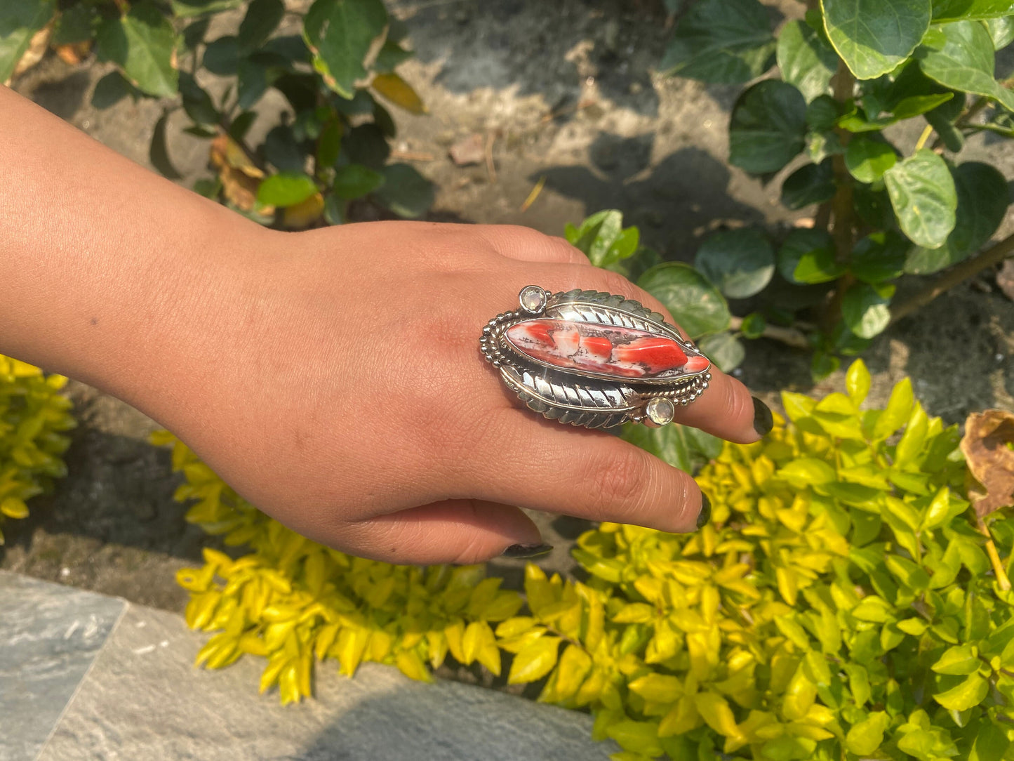 Hammered Spiny Oyster Ring with Floral Carved Design on Tibetan silver.