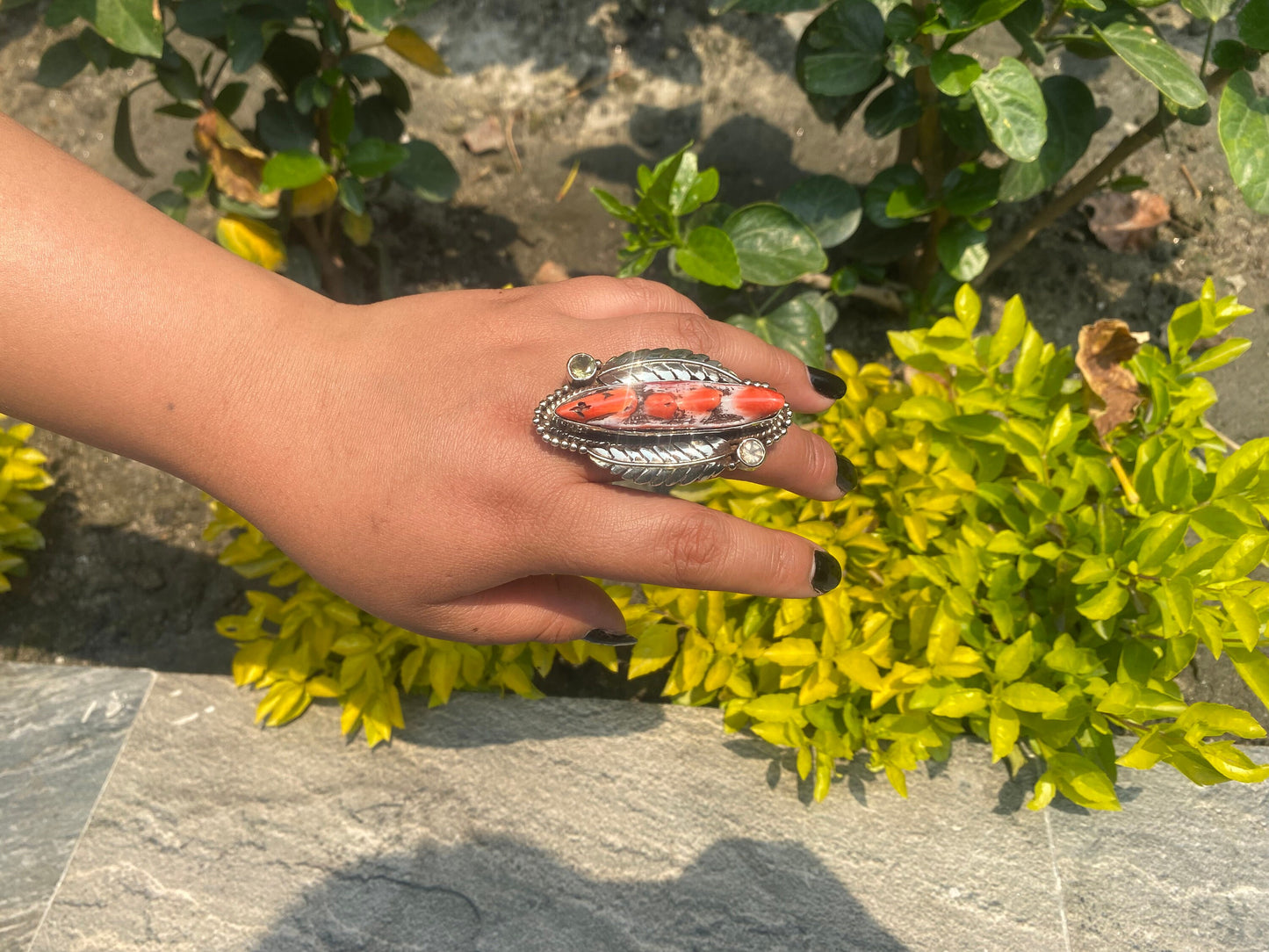 Hammered Spiny Oyster Ring with Floral Carved Design on Tibetan silver.