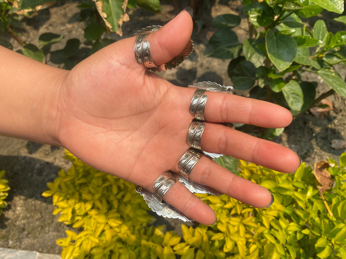 Hammered Spiny Oyster Ring with Floral Carved Design on Tibetan silver.