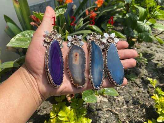 Enchanted Earth: Agate Slice Pendant Adorned with Tibetan Silver,Agate Slice Pendant with Tibetan Silver.