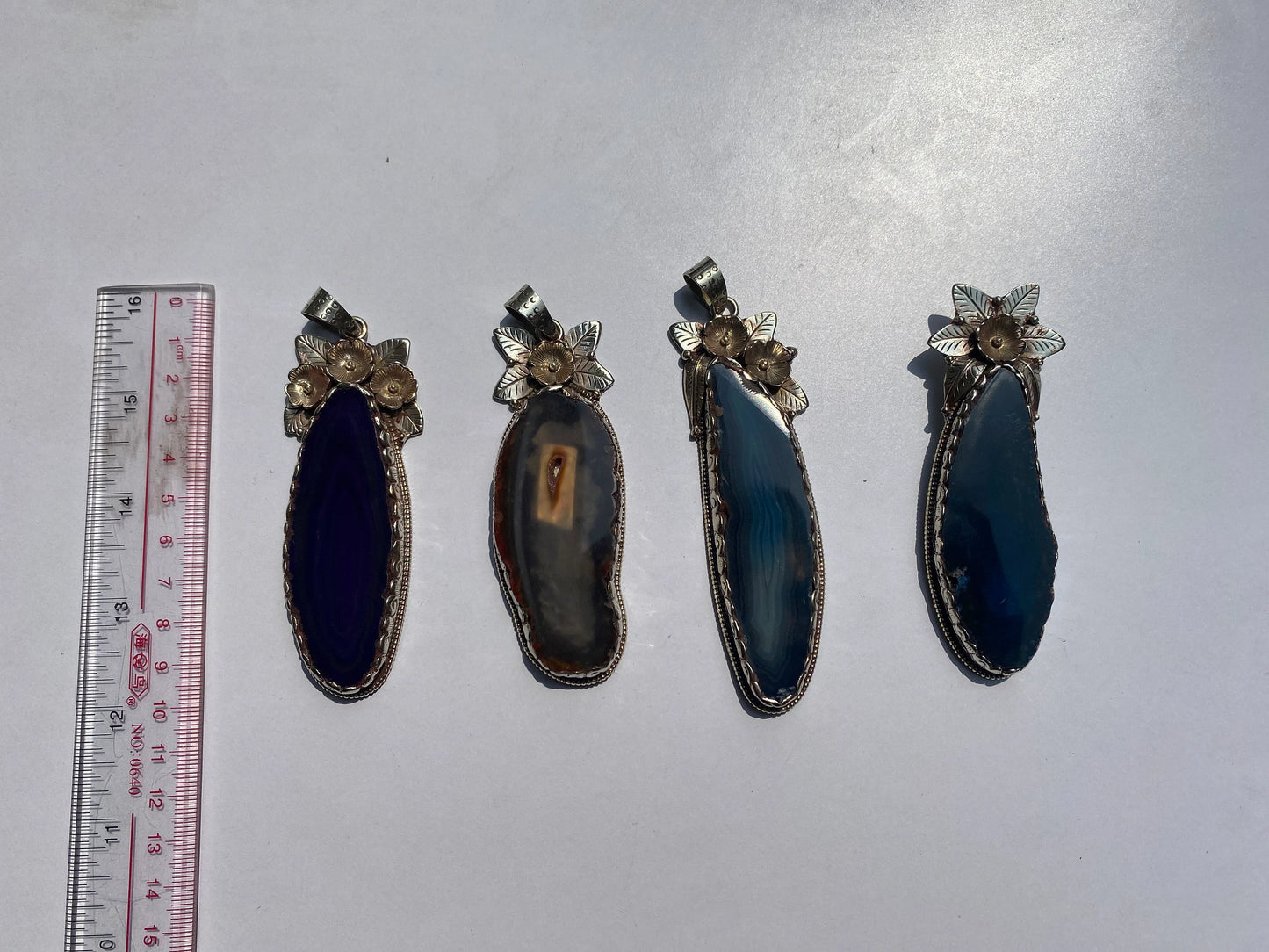 Enchanted Earth: Agate Slice Pendant Adorned with Tibetan Silver,Agate Slice Pendant with Tibetan Silver.