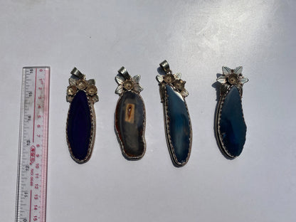 Enchanted Earth: Agate Slice Pendant Adorned with Tibetan Silver,Agate Slice Pendant with Tibetan Silver.