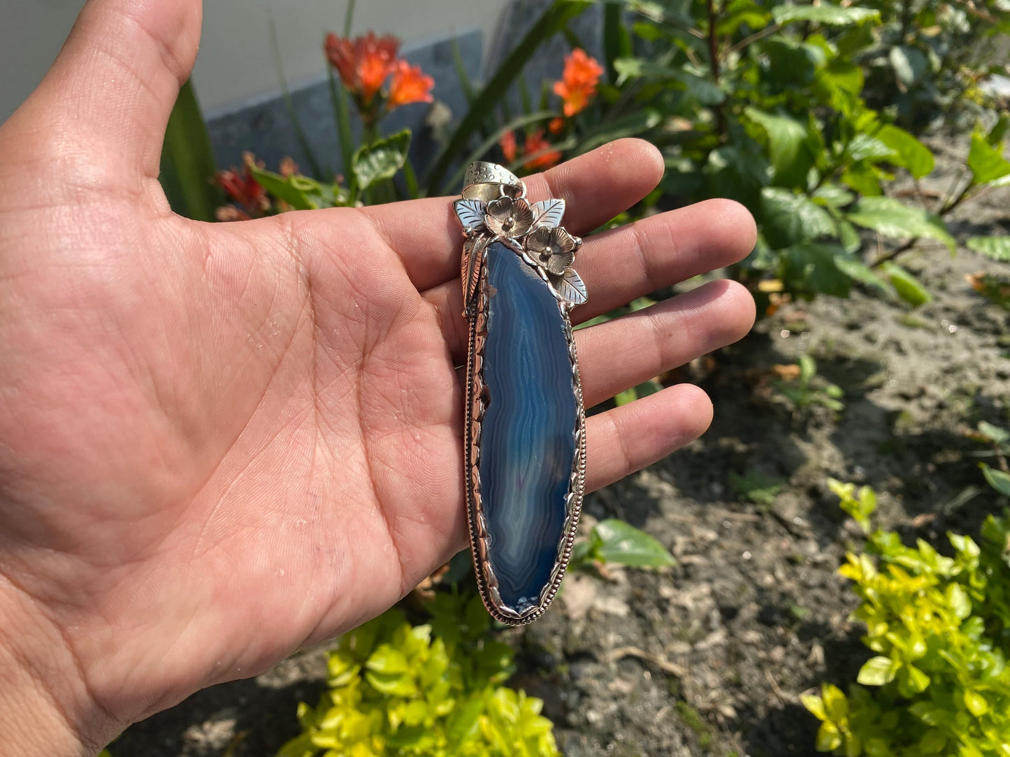 Enchanted Earth: Agate Slice Pendant Adorned with Tibetan Silver,Agate Slice Pendant with Tibetan Silver.