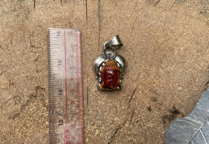 Buddha face carved Pendant, Healing Pendant, Hand Carved Pendant, Pendant for Positivity, Resin Pendant.