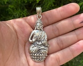 Awakened Soul: Carved Buddha Amulet in Tibetan Silver,Enlightened Guardian, Carved Buddha on Tibetan Silver Pendant.