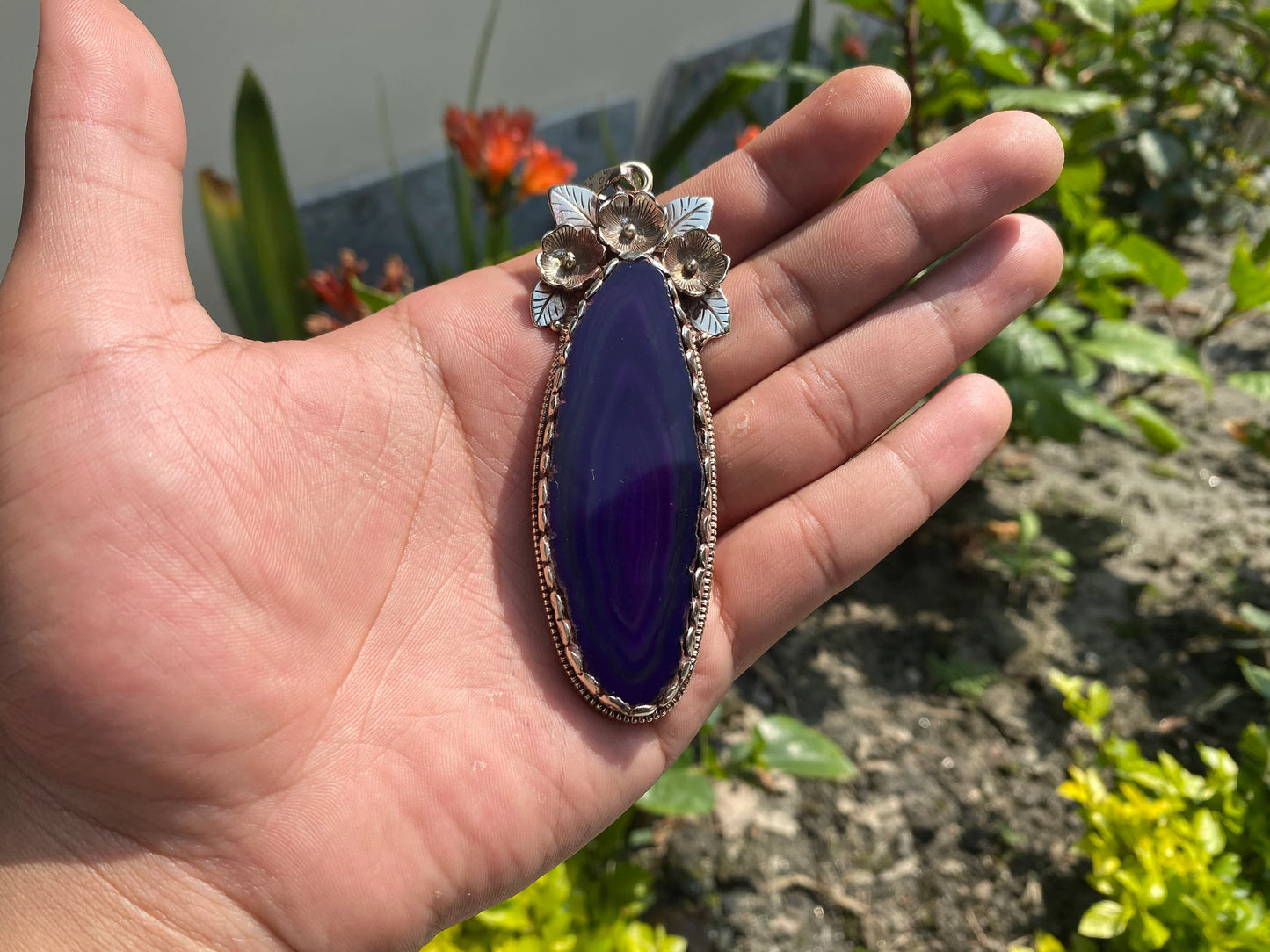 Enchanted Earth: Agate Slice Pendant Adorned with Tibetan Silver,Agate Slice Pendant with Tibetan Silver.