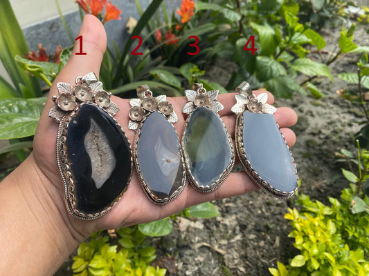 Handcrafted by Mother Nature: Agate Slice Pendant decorated with Tibetan Silver Details.