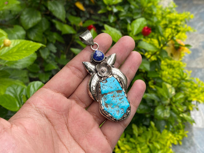 Handmade Nepalese Pendant: Turquoise, Lapis, and Floral Tibetan Silver, Timeless Unisex Turquoise and Lapis Pendant , Bohemian fashion.