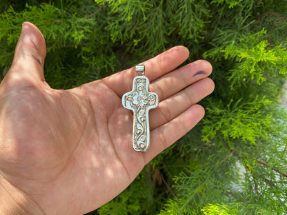 Sacred Harmony: Intricately Carved Buffalo Bone Cross with Tibetan Silver, Buffalo Bone Cross Enhanced with Tibetan Silver.