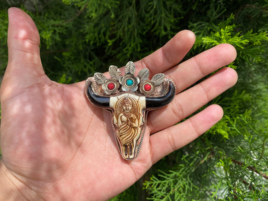 Unique Tibetan Silver Longhorn Bull Pendant with Intricate Buddha Carving with added turquoise and coral.