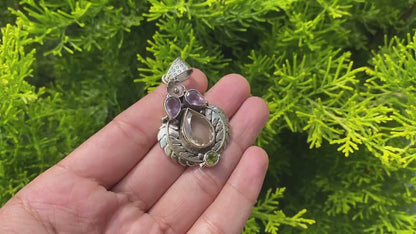 Unique Tibetan silver pendant adorned with Smokey Quartz, Peridot and Amethyst, Handmade floral design, Collectible pendant for daily wear.