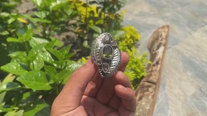 Big Adjustable Handmade Ring, Tibetan Silver Ring adorned with White Topaz, Smoky Quartz and Peridotite.