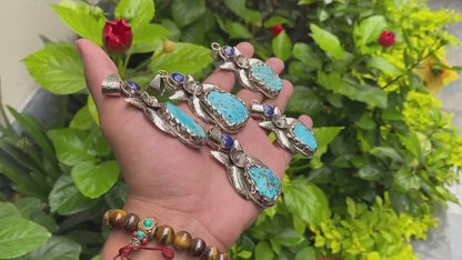Aesthetic Natural Turquoise Pendant for daily wear, Floral details on Tibetan silver and adornment of Raw Lapis, Unique piece, Boho fashion.